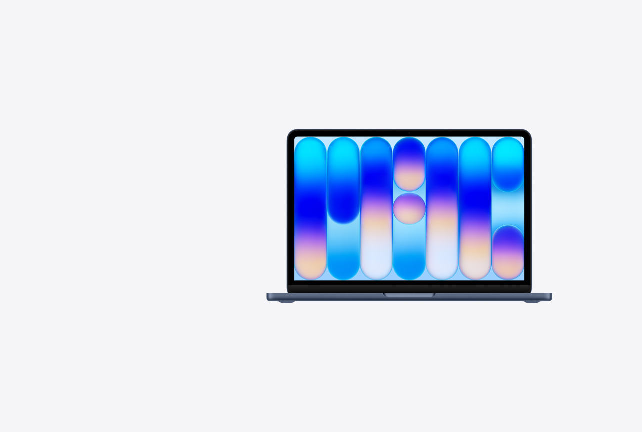 Otevřený MacBook Neo v barvě indigo, tapeta s abstraktním barevným vzorem